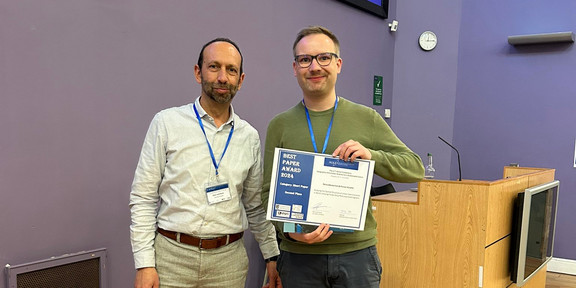 René Westerholt and Rob Lemmens during the awards ceremony at the AGILE 2024 conference