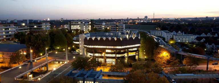 University library at night Brightly illuminated library of TU Dortmund University at night